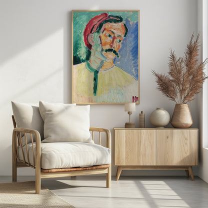 An expressionist portrait painting of a man with a thick black mustache wearing a red cap. His face is painted with a vibrant palette of orange, yellow, and pink, with green and blue used for shadows. The background is a mix of turquoise and deep blue, and the entire piece features heavy, visible brushstrokes. Artwork