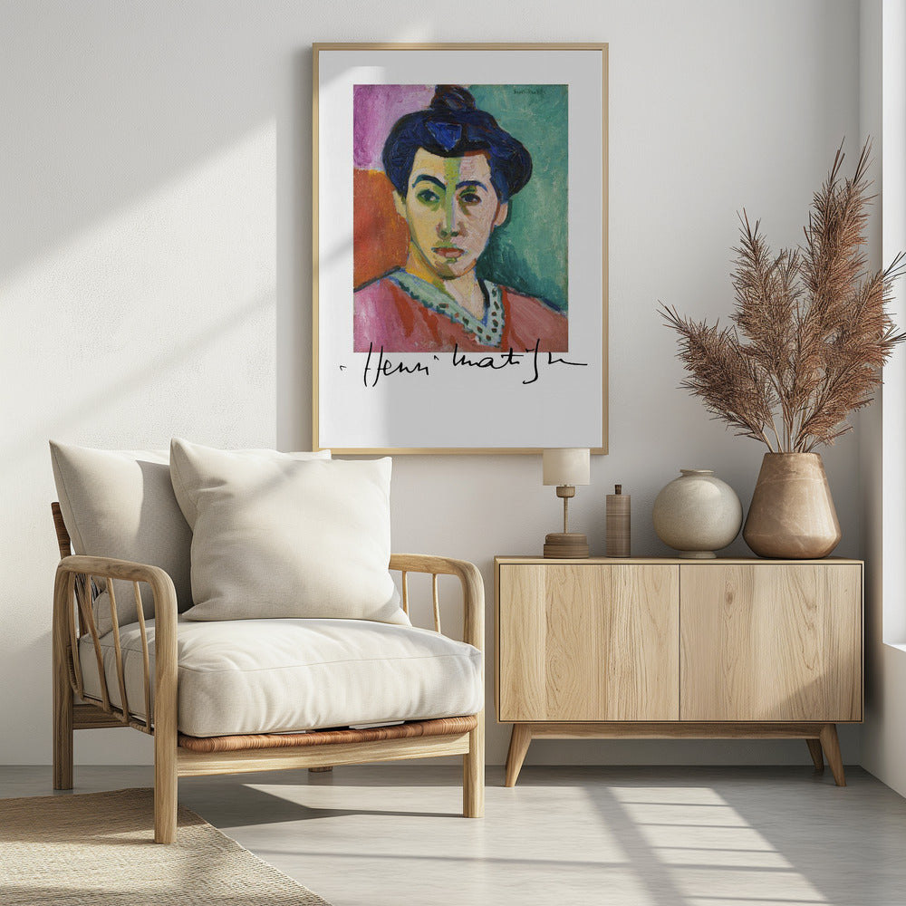 A framed art print of Henri Matisse's famous Fauvist painting, 'The Green Stripe (Portrait of Madame Matisse)'. The portrait features a woman with her hair up, her face divided by a vertical green stripe against a background of bold color blocks in purple, red, and green. The artist's signature is visible below the painting. Poster