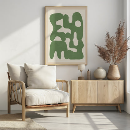 A framed abstract art print featuring large, organic, sage green shapes with soft, rounded edges against a solid cream background. The shapes interlock and create intriguing negative spaces, giving the composition a modern and balanced feel. Poster