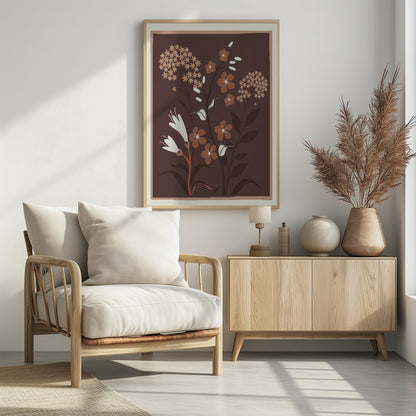 A modern botanical illustration featuring stylized flowers in shades of rust, cream, and light brown against a deep brown background. The framed artwork showcases a variety of floral shapes, including trumpet flowers and small clustered blossoms, in a simple, elegant composition. Artwork