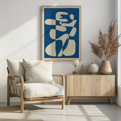 A modern abstract art print in a thin black frame. The composition features a bold royal blue background with a large, interlocking biomorphic shape in a creamy off-white color. The shape is fluid and complex, with soft curves and rounded forms that twist and connect throughout the frame. Decor