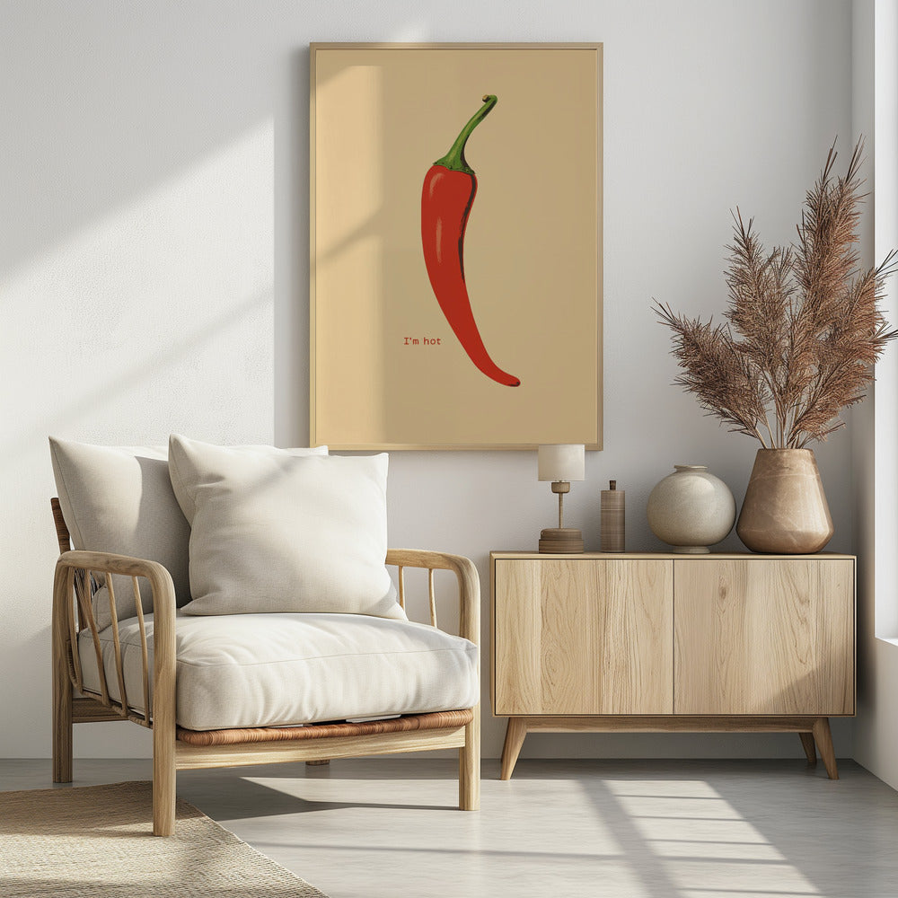 A minimalist poster in a black frame featuring a single, vibrant red chili pepper with a green stem against a cream background. Below the pepper, the text 'I'm hot' is printed in a simple font. Print
