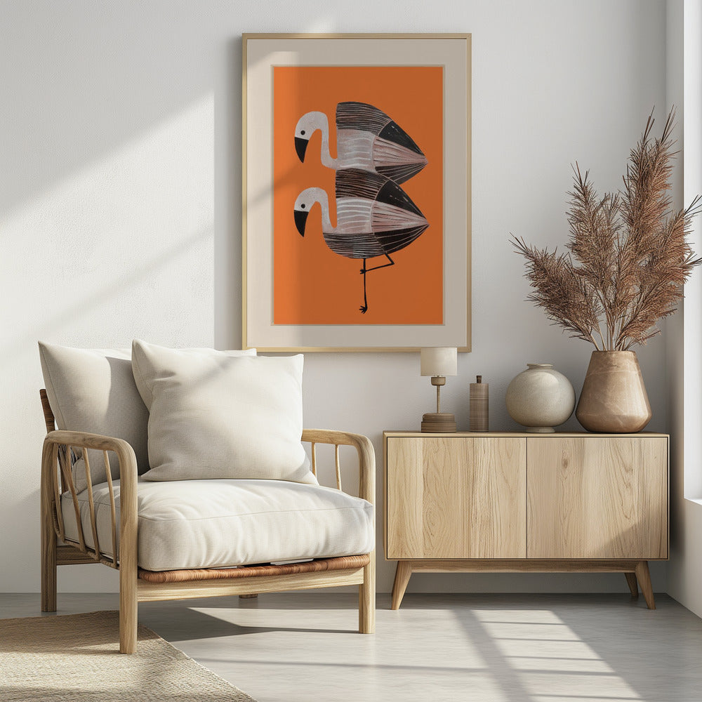 A framed art print of two stylized flamingos against a solid orange background. The birds are stacked vertically, with white heads, black beaks, and bodies featuring black, white, and grey stripes. The lower bird is standing on one leg. Wall Art