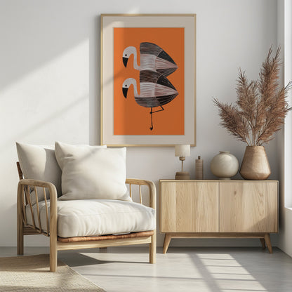 A framed art print of two stylized flamingos against a solid orange background. The birds are stacked vertically, with white heads, black beaks, and bodies featuring black, white, and grey stripes. The lower bird is standing on one leg. Wall Art