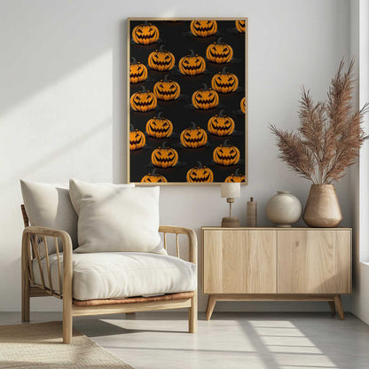 A framed poster featuring a repeating pattern of cartoonish, grinning jack-o'-lanterns on a solid black background. Each orange pumpkin has a sinister smile, triangular eyes, and a dark, curved stem. Faint spiderwebs are visible behind some of the pumpkins, adding to the spooky Halloween theme. Poster