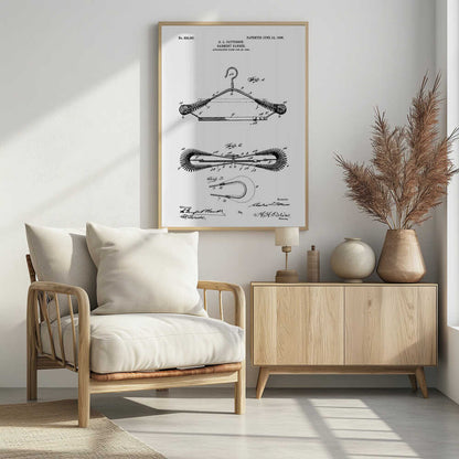 A framed black and white patent illustration for a garment hanger by C. L. Patterson, patented June 12, 1906. The drawing displays three figures detailing the hanger's mechanical design, with cursive signatures at the bottom. Wall Art