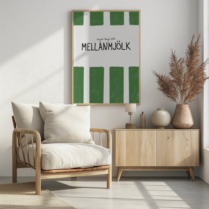 A minimalist graphic art print with a white textured background. It features hand-painted green stripes at the top and bottom. In the center, there is hand-written text in black that reads 'Jag är långt ifrån MELLANMJÖLK'. The entire piece is enclosed in a simple black frame. Poster