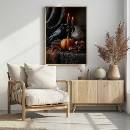 A moody and atmospheric still life featuring a black raven perched on a stack of old books next to a bright orange pumpkin. Two lit candles in ornate bronze holders cast a warm glow on an embossed metal vase, crystal glasses, and a dark, patterned tablecloth. Decor