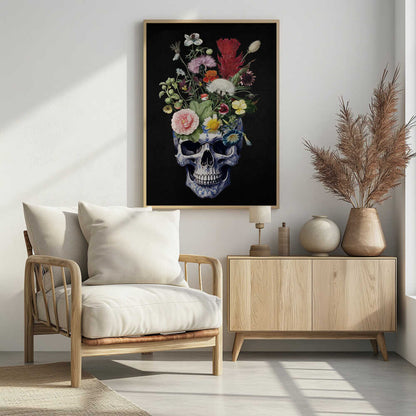 A detailed painting of a human skull that serves as a vase for a vibrant bouquet of flowers. The skull is adorned with a blue and white porcelain-like pattern, and the overflowing flowers include pink peonies, red cockscomb, and yellow daisies against a solid black background. Poster