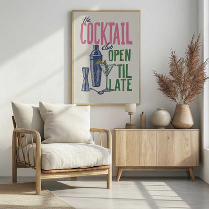 A vintage-style poster for 'The Cocktail Club' on a cream background. The word 'COCKTAIL' is in large pink block letters, while 'OPEN 'TIL LATE' is in green. Blue illustrations of a martini glass, cocktail shaker, and jigger complete the design. Print