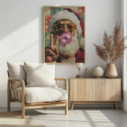 A close-up pop art style painting of Santa Claus wearing large, gold star-shaped sunglasses. He is blowing a big pink bubble with bubblegum and holding up his hand in a peace sign. The background is a colorful, patterned collage. Artwork