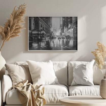 A moody black and white photograph of a snowy day in New York City's Times Square. The wet streets reflect the bright lights of the surrounding buildings and billboards as pedestrians cross the street and cars wait in traffic. Artwork