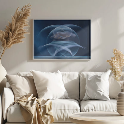 An abstract long-exposure photograph of a spinning dancer, creating ethereal, intersecting trails of blue and white light that form a glowing, orb-like shape against a deep blue background. The image is presented within a silver frame. Poster