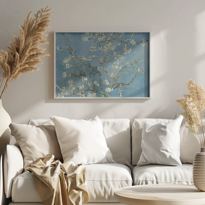 A framed print of Vincent van Gogh's painting 'Almond Blossom,' featuring delicate white blossoms on gnarled branches set against a vibrant turquoise-blue sky. Poster