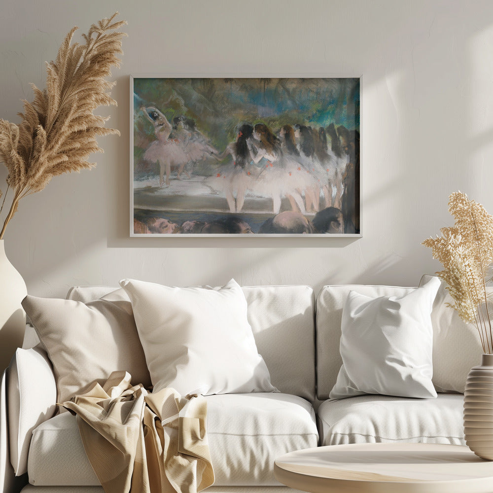 An impressionistic painting by Edgar Degas of a ballet performance, showing ballerinas in pink and white tutus on a stage with a lush backdrop, as seen from the perspective of the audience. The artwork is mounted in a silver frame. Artwork