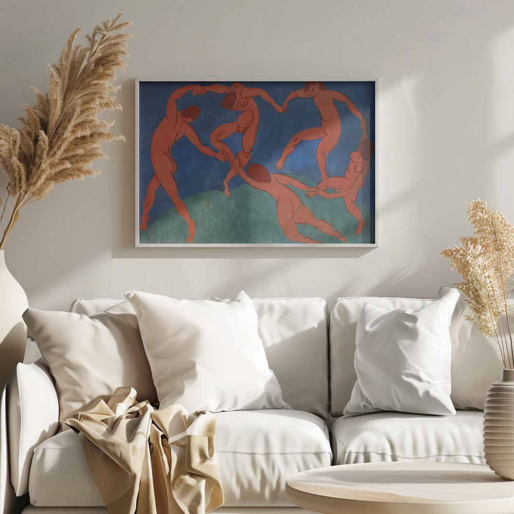 A framed print of Henri Matisse's painting 'The Dance,' featuring five nude, reddish-orange figures holding hands and dancing in a circle against a vibrant blue sky and a green hill. Decor