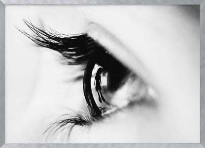 A dramatic black and white macro photograph of a human eye in profile, with a surreal reflection of a person's silhouette visible in the pupil. Print