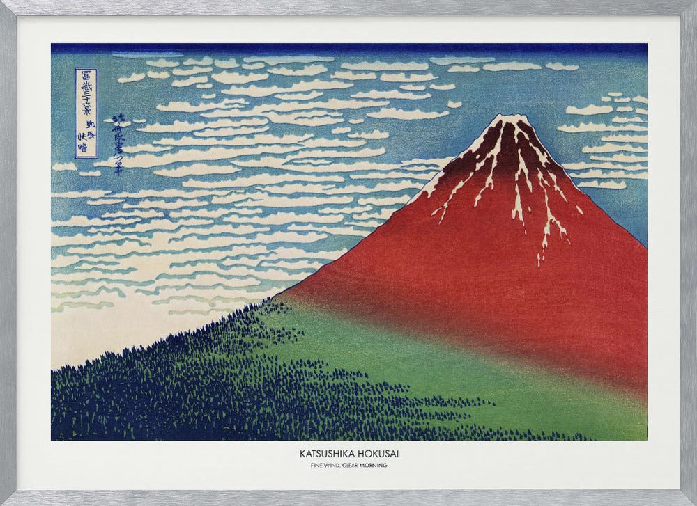 A framed Japanese woodblock print, 'Fine Wind, Clear Morning' by Katsushika Hokusai, also known as 'Red Fuji'. The print depicts a large, reddish-brown Mount Fuji with its peak lightly dusted with snow, set against a vibrant blue sky filled with white, streaky clouds. A dark green forest covers the base of the mountain. Poster