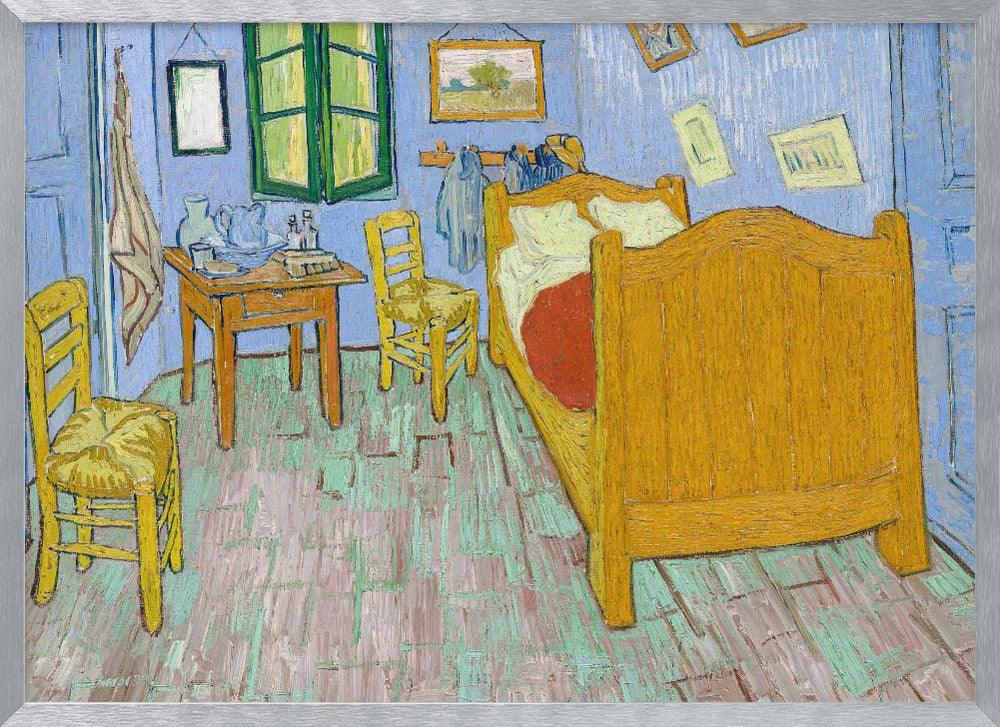 Vincent van Gogh's famous painting, 'The Bedroom,' depicting his room in Arles. The artwork, characterized by bold colors and expressive brushstrokes, features a yellow wooden bed, chairs, a small table against light blue walls, and a green-shuttered window. The painting is displayed in a simple silver frame. Decor