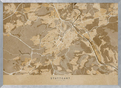 A framed, stylized map of Stuttgart, Germany, in shades of brown and beige. Major roads and waterways are highlighted in a contrasting cream color, creating a detailed and modern look. The city name 'STUTTGART' is written at the bottom. The entire map is enclosed in a simple silver-colored frame. Poster