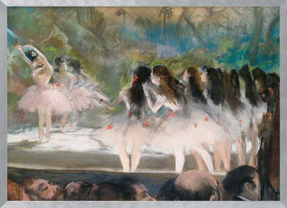 An impressionistic painting by Edgar Degas of a ballet performance, showing ballerinas in pink and white tutus on a stage with a lush backdrop, as seen from the perspective of the audience. The artwork is mounted in a silver frame. Artwork