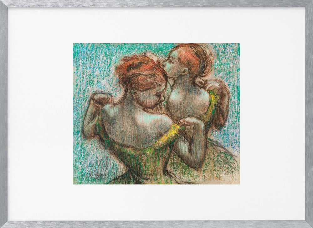 A framed pastel drawing by Edgar Degas, 'Two Dancers', depicting two ballerinas from behind. One dancer in a green dress with a yellow strap adjusts her costume, while another stands closely behind her against a textured turquoise background. The style is Impressionistic, capturing a candid moment. Artwork