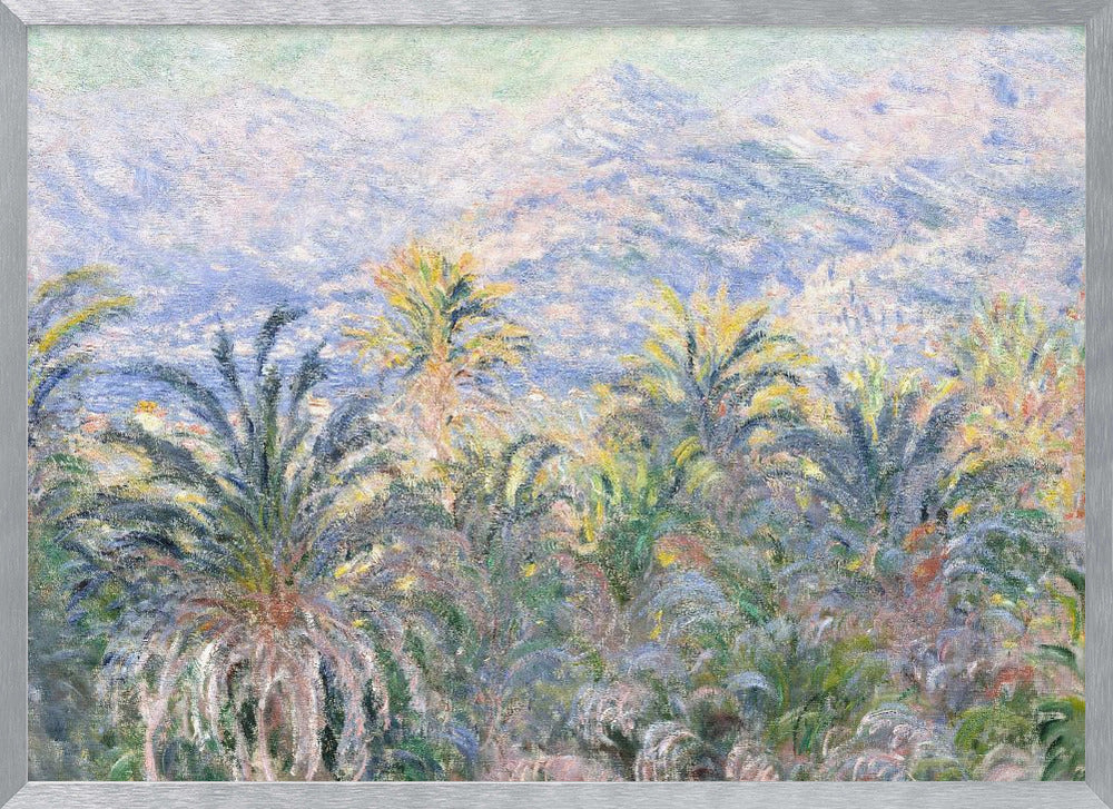 Impressionist painting 'View of Bordighera' by Claude Monet, featuring a lush foreground of green and yellow palm trees overlooking a hazy, sun-drenched coastal town and distant blue mountains, all rendered with soft, dappled brushstrokes and set within a silver frame. Artwork