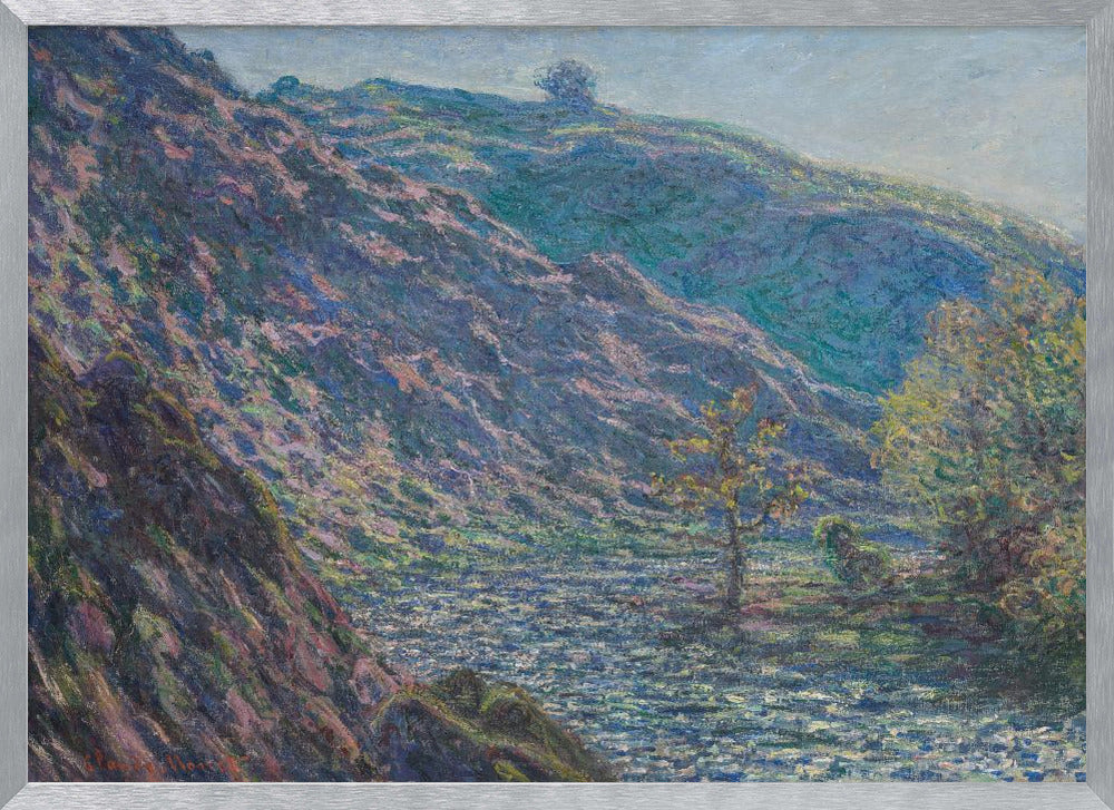 A framed Impressionist painting depicting a river valley. A steep hillside with purple and blue tones dominates the left, while a sun-dappled river flows below. In the distance, gentle green and blue hills rise against a pale sky. Artwork