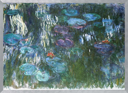 An impressionist painting by Claude Monet of his water lily pond. The canvas is filled with cool tones of green, blue, and purple depicting the water and lily pads. Short, vertical brushstrokes of white and yellow suggest the reflection of light on the water's surface, while small dabs of orange indicate blooming flowers. The entire painting is enclosed in a modern silver frame. Artwork