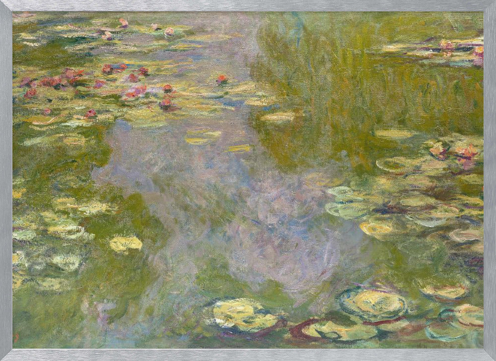 An impressionist painting of a water lily pond by Monet, featuring pink and red water lilies floating amongst green pads on the water's surface, which reflects the surrounding greenery and sky in shades of green, blue, and violet. The painting is displayed in a modern silver frame. Wall Art