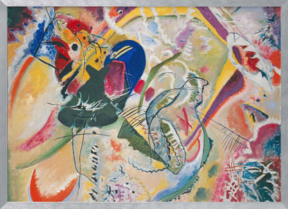 A vibrant and chaotic abstract painting by Wassily Kandinsky, presented in a silver frame. The artwork is a whirlwind of bold colors like yellow, blue, red, and green, with dynamic, intersecting black lines and a variety of shapes creating a sense of energetic movement. Print
