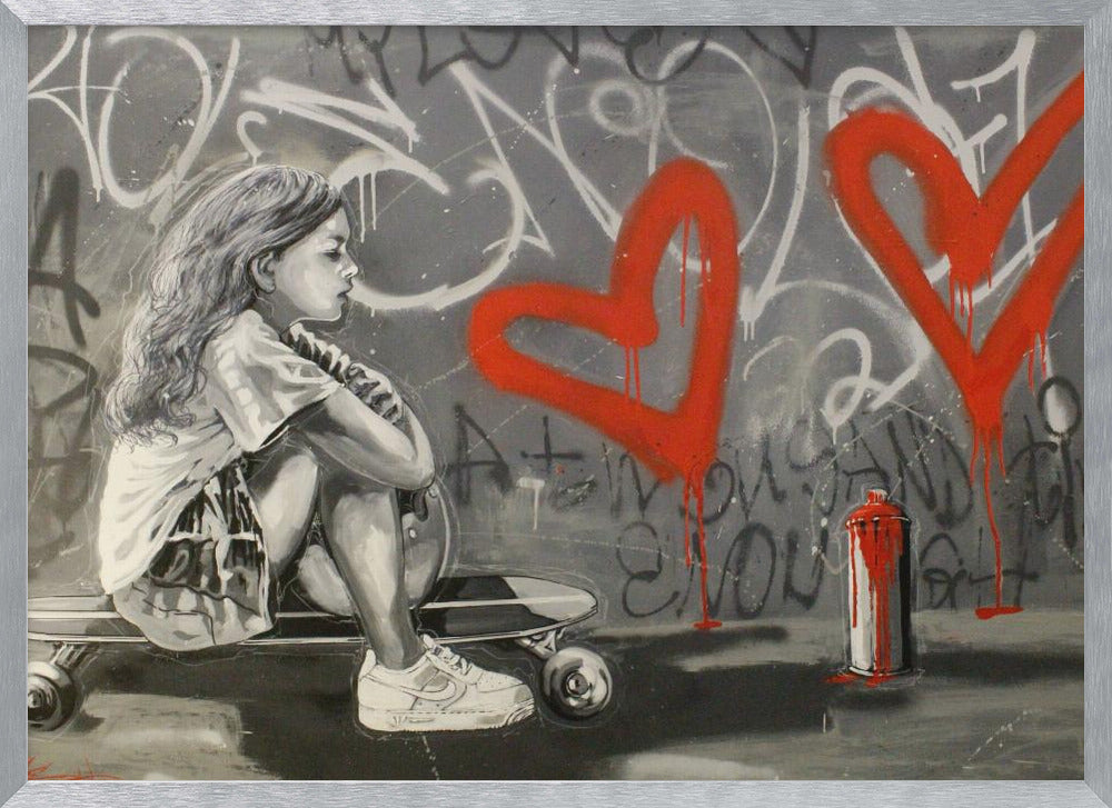 A monochrome street art painting of a young girl with long hair sitting thoughtfully on a skateboard. Behind her, a grey wall is covered in graffiti tags and two large, bright red hearts are spray-painted with drips running down. A red and white spray paint can sits on the ground next to her. Artwork
