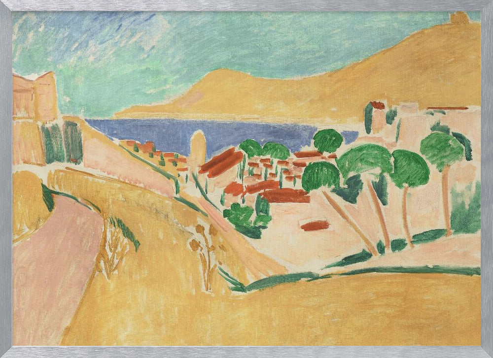 A Fauvist-style painting of a sunny coastal town, enclosed in a silver frame. The scene features warm yellow and pink hills, a village with red-roofed buildings and vibrant green trees, set against a deep blue sea and a large golden hill under a light blue sky. Print