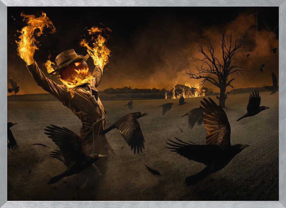 A terrifying scarecrow with a glowing jack-o'-lantern for a head stands in a dark field, its hands engulfed in flames raised towards the sky. A flock of black crows flies around it in a frenzy, while in the background, a barn burns under a dark, smoky orange sky. Wall Art