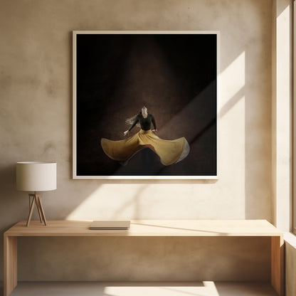 A framed photograph of a woman dancing against a dark, moody brown background. She is captured mid-spin, with her long, vibrant yellow skirt fanning out around her. Her head is thrown back, and her long hair is in motion, conveying a sense of freedom and passion. Poster