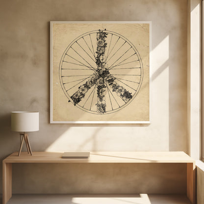 A framed, vintage-style ink drawing of a bicycle wheel. Inside the wheel, a peace sign is formed out of intricately drawn flowers and vines. The background has a textured, aged paper appearance in a sepia tone. Print