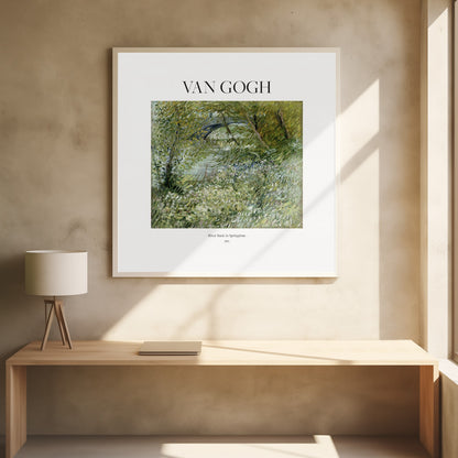 A framed art print of Vincent van Gogh's painting 'River Bank in Springtime'. The impressionist artwork depicts a lush green riverside scene with white flowers and a distant bridge, framed in light wood with a white mat. Wall Art