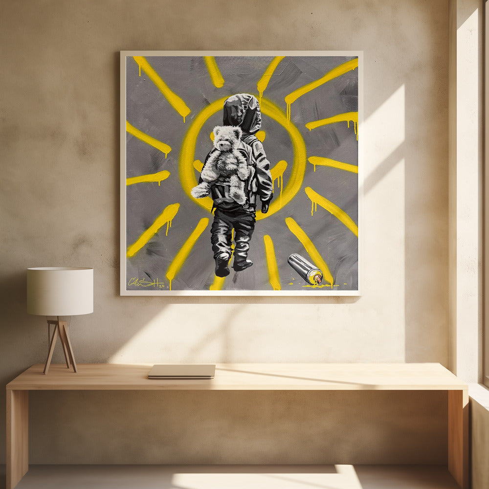 A framed street art-style painting with a grey background. A large, yellow, spray-painted sun with dripping rays dominates the scene. In the foreground, a small child in a dark hoodie and pants is depicted from behind in black and white, carrying a fluffy teddy bear on their back. A discarded spray paint can lies on the ground in the bottom right corner. Poster