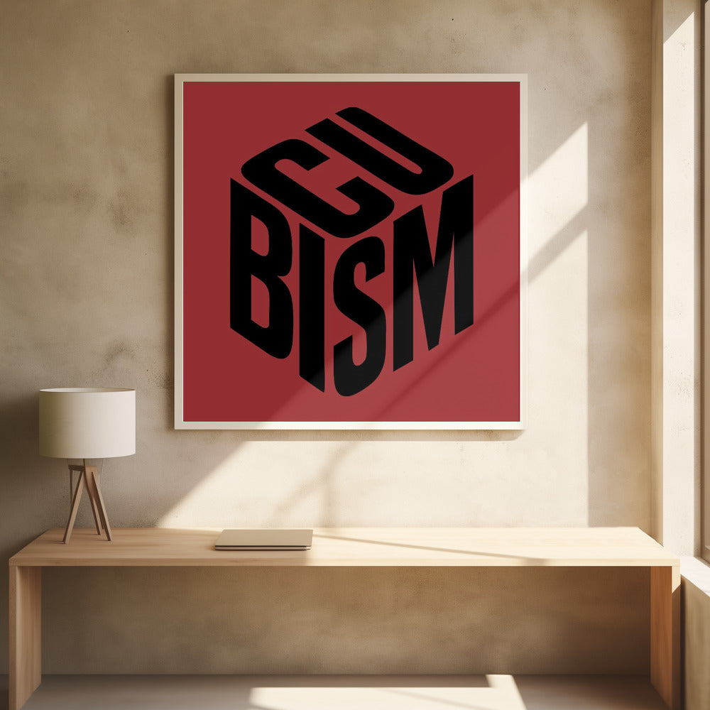 A graphic art print with a deep red background in a light wood frame. In the center, the word 'CUBISM' is rendered in bold black letters, arranged to form the three visible sides of an isometric cube. 'CU' is on the top face, 'BI' is on the left face, and 'SM' is on the right face. Artwork