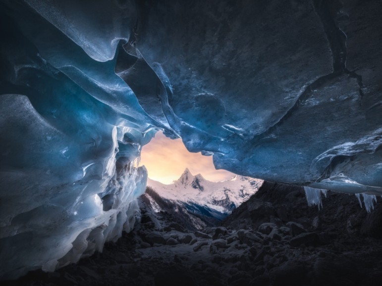 Ice cave and snow mountain Poster 70x100 cm